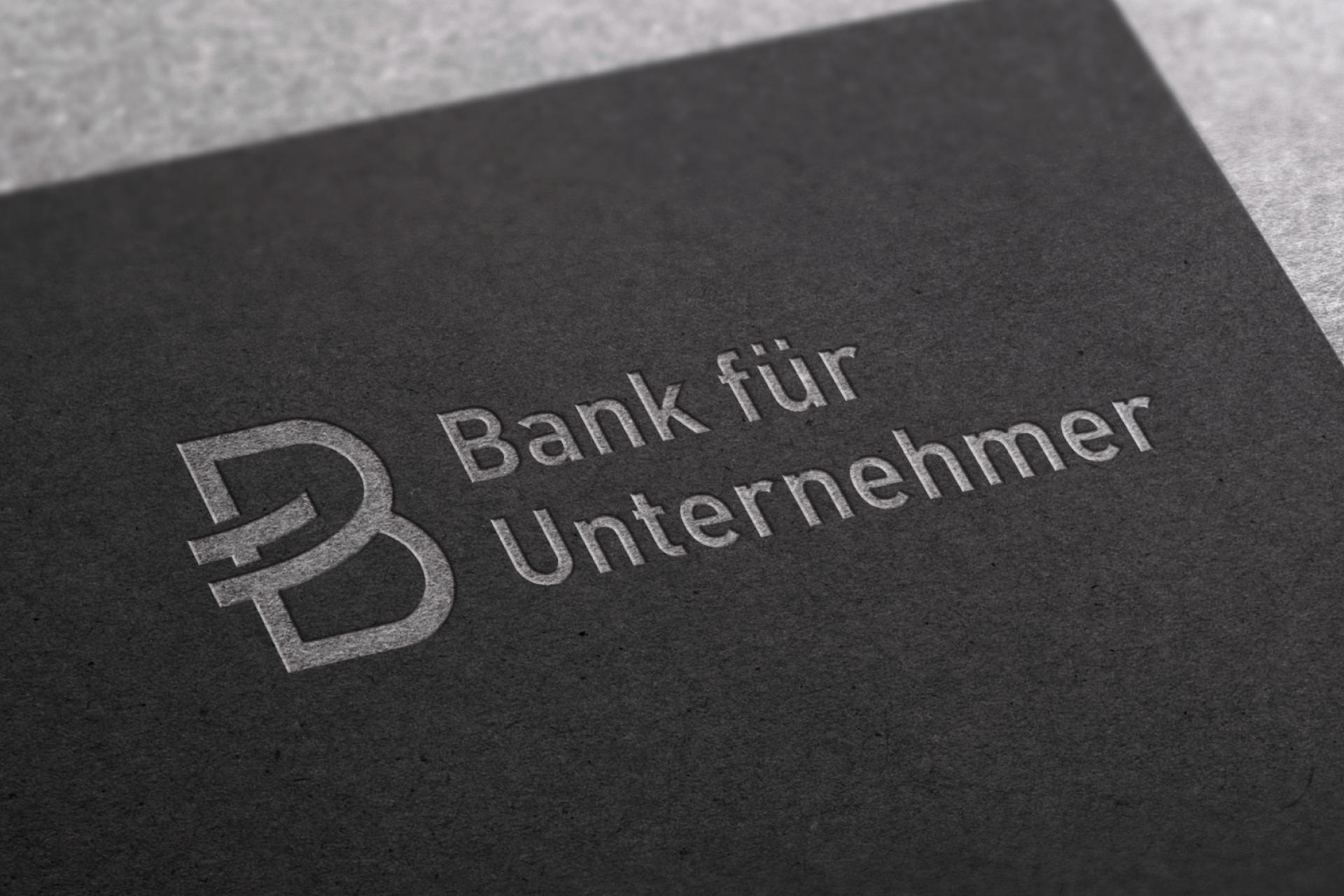 projekt-bank-fuer-unternehmer-logo-praegung Bank für Unternehmer Logo Prägung